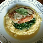 Saltimbocca is a Mediterranean dish that originated in Italy and can be traced back to Roman Times. While veal is the meat traditionally used in making this dish, any meat can be used. This version of Saltimbocca with wilted Spinach and Polenta is on the table in just over 30-minutes and the flavors are fully satisfying.