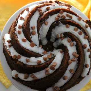 Originally posted in June, 2013, this Butter Rum Bundt Cake has received a photo update. This cake is still one of my husband's favorite cakes and my co-workers are all talking about it again as well. There's just something about the (non-alcoholic) butter rum flavor that folks enjoy and this cake is super moist because of the addition of pudding mix.