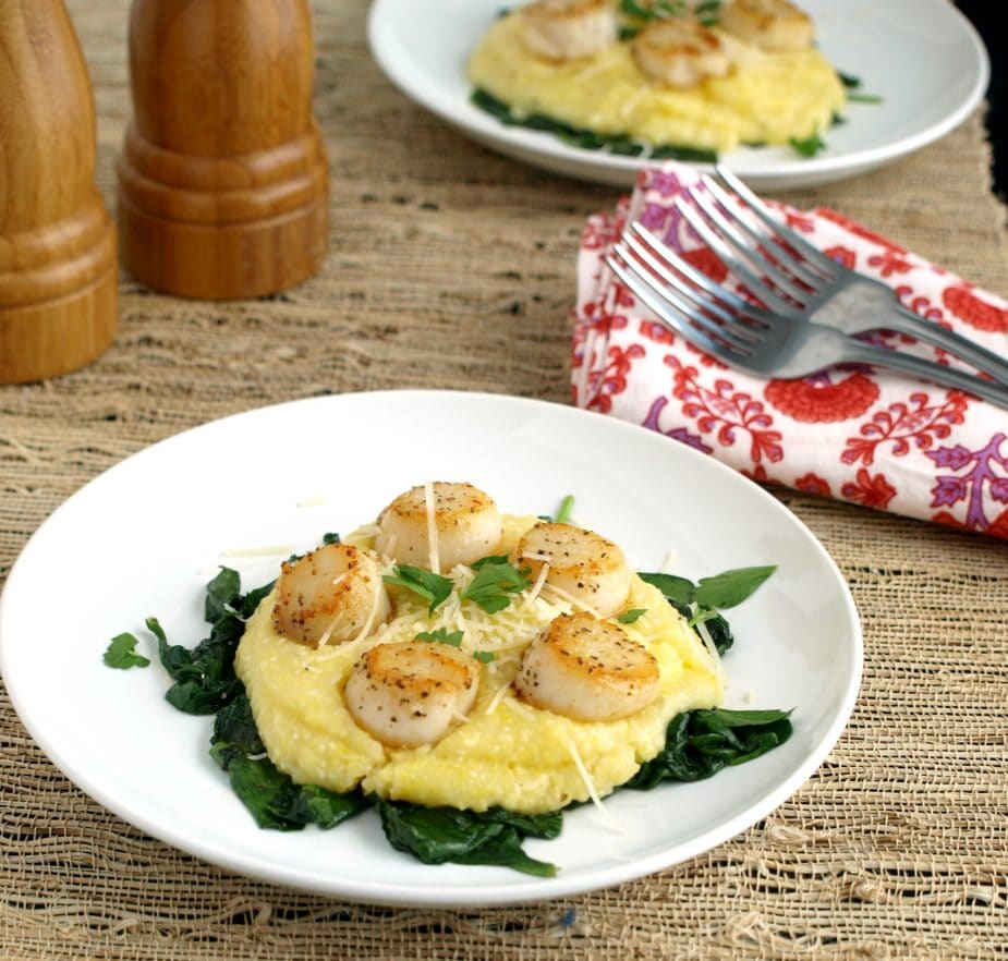 Perfectly Pan Seared Scallops on Parmesan Polenta have golden brown edges and are sweet, tender and delicious!