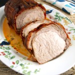 This Bacon Wrapped Pork Loin is so tender it can be cut with a fork. The smoked paprika lends a distinct flavor to the meat and aroma to the kitchen.