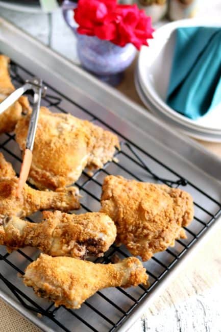 Oven fried Chicken is baked in the oven for a crispy coating without the added preservatives and MSG, unlike the big chain chicken places.