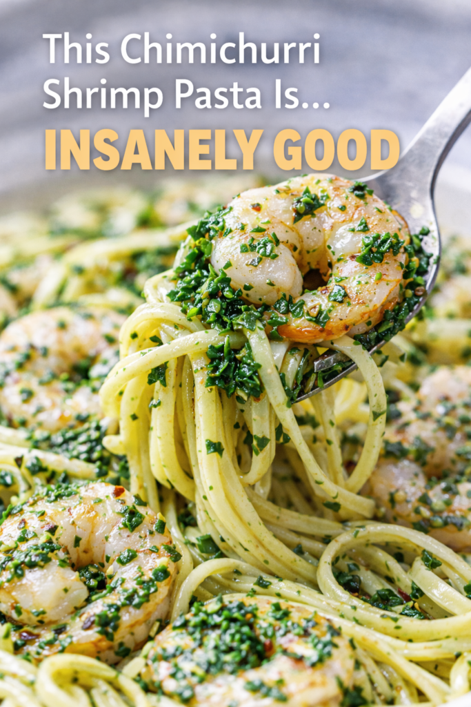 Chimichurri Shrimp Pasta with Fresh Herb Garlic Sauce 11 Lifted bite of chimichurri shrimp pasta showing herbs, shrimp, and glossy noodles.