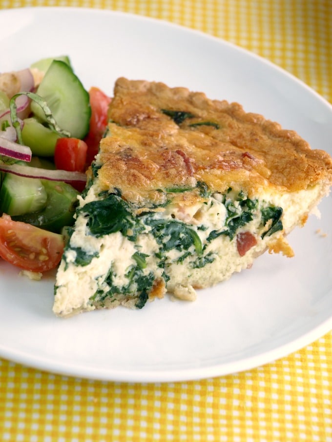 Spinach and Bacon Quiche is easy to prepare at home and since many can be made at once, can easily feed a crowd.