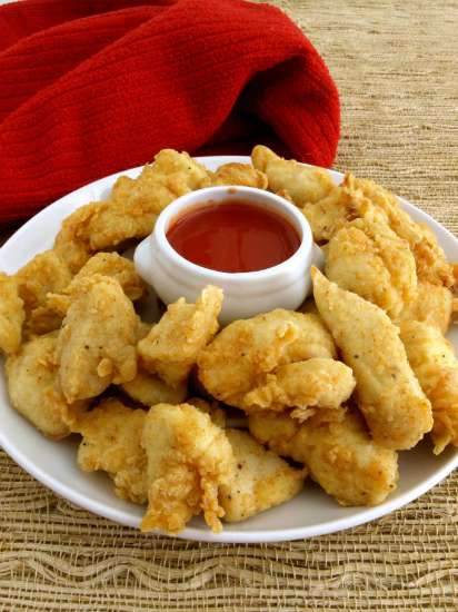 Paired with our Polynesian Sauce -- my daughter says these Chick-fil-A Chicken nuggets are the best chicken nuggets ever! |KitchenDreaming.com |