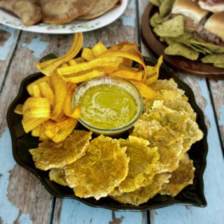 Homemade Green Plantain Chips with Mojo Vinaigrette are so easy to make and are reminiscent of the style chips served in the Cuban cafes