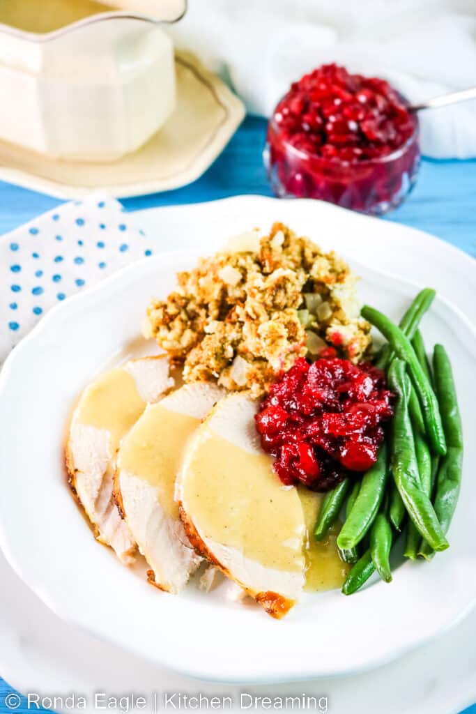 This Crock Pot Turkey Breast is the easiest way to cook a turkey breast. Slow cooking in the crock pot keeps this turkey breast moist and juicy! Afterward, use the drippings to make a rich and savory pan gravy. After all, turkey dinner isn't complete without gravy! This Crock Pot Turkey Breast is perfect for a small gathering of between 1 and 6 people.