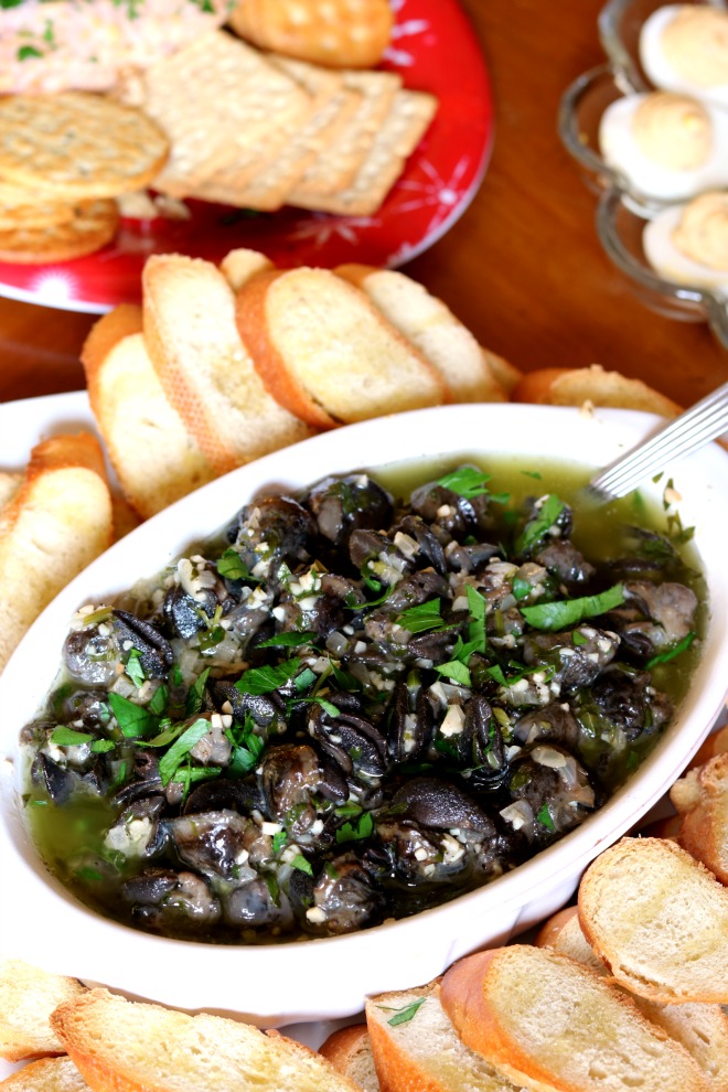 Escargots à la Bourguignonne are tender & delicious. Serve with a crusty baguette for sopping up the butter sauce & you have the perfect quick & easy app.