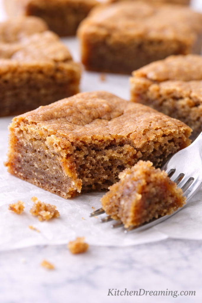 Chewy Brownie Recipe with Brown Sugar (Easy From Scratch) 5 Close up fork bite of a chewy brownie recipe made with brown sugar, showing a moist, dense texture and soft chewy center.