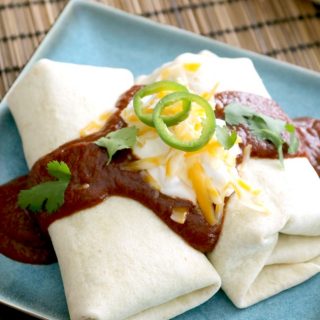 These Cheesy Beef and Bean Burritos make a great lunch, dinner or snack on-the-go. They are freezer friendly and reheat easily in the microwave.