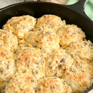 These Loaded Breakfast Biscuits are a family favorite because they are easy to make and portable, so they are perfect to grab one (or two) on the go. They are also a great brunch menu item. Same great taste as a layered breakfast biscuit with the components baked right in!