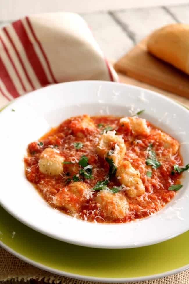 A simple fresh pomodoro tomato sauce over pillowy, soft gnocchi. Gnocchi in Pomodoro Sauce; it's what's for dinner. Yum. 
