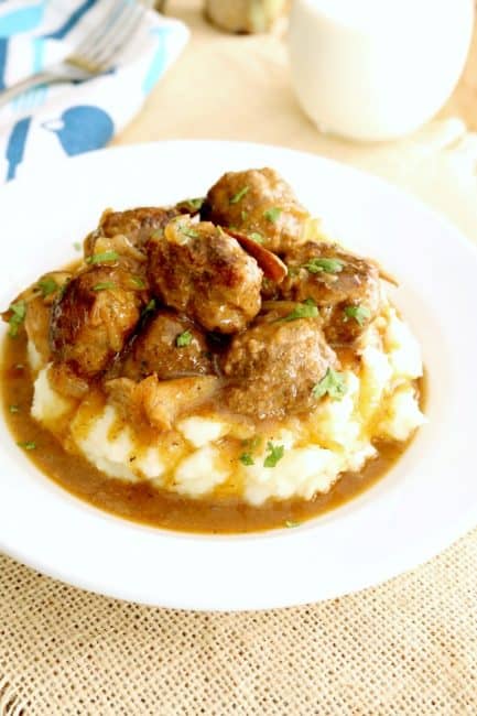 These Salisbury Steak Meatballs with Mushroom Gravy are classic comfort food. This incredibly delicious dinner recipe is ready in about 30-minutes! #Salisbury #Steak #Meatballs #Recipe #KitchenDreaming