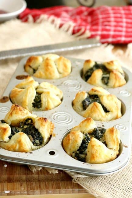 Spinach Puffs make an easy and elegant appetizer for Holiday entertaining. These can be prepared a day or two in advance and then baked off just before the party. Ready in just 12 minutes, these Spinach Puffs make entertaining easy!