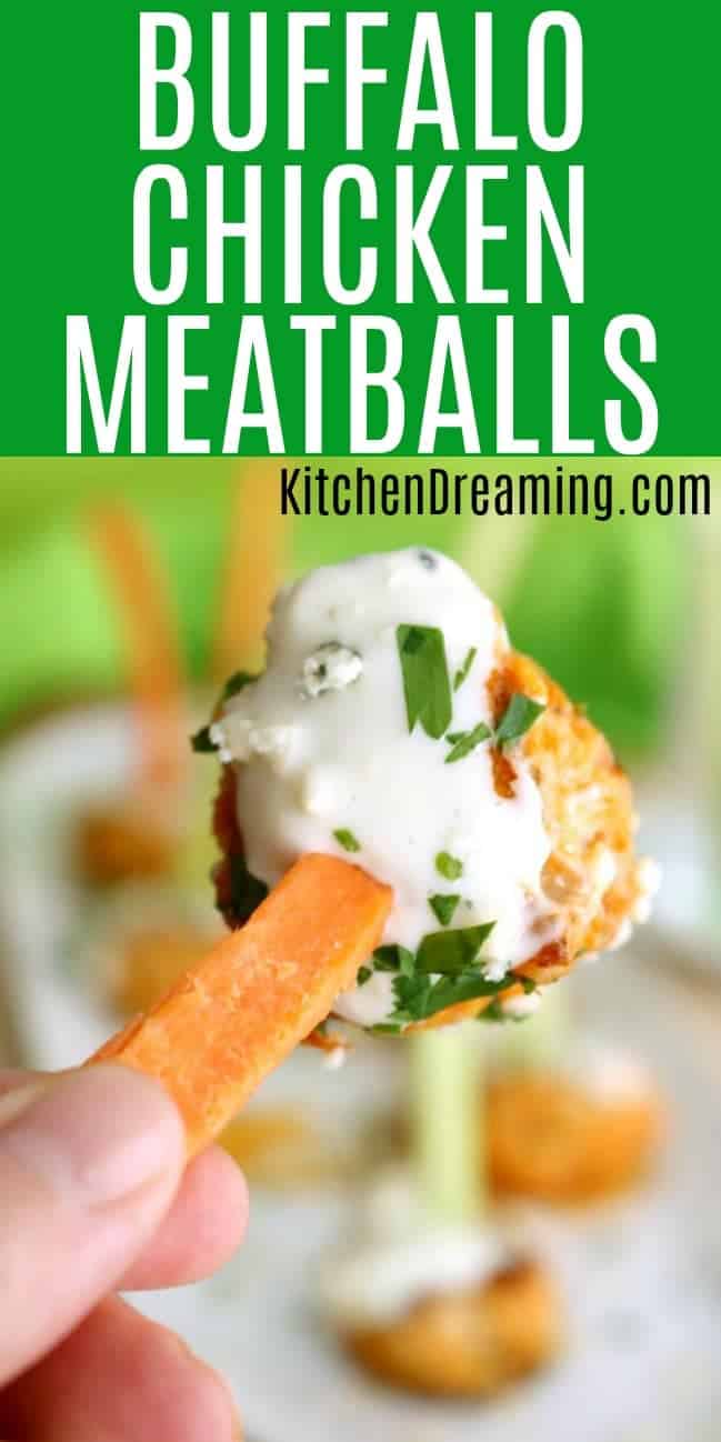 A buffalo chicken meatball drizzled with chunky blue cheese dressing and a carrot stick skewer