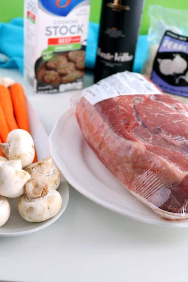 a photo of the ingredients for crock pot pot roast