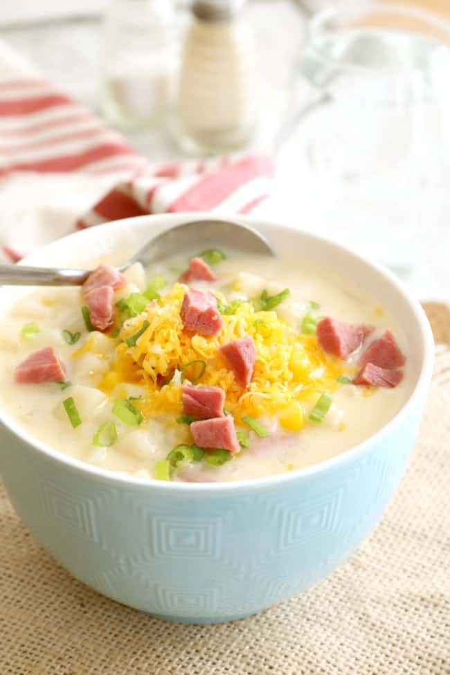 Ham Chowder in a bowl with a spoon