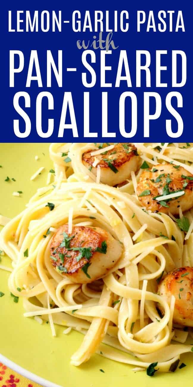 A plate of lemon garlic pasta with pan-seared scallops