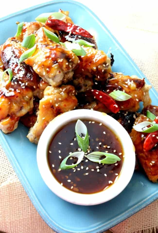 America's favorite sweet and spicy, General Tso’s sauce smothering crispy, baked chicken wings! No extra breading, frying or fuss! Come on in and give these General Tso Chicken Wings a try.