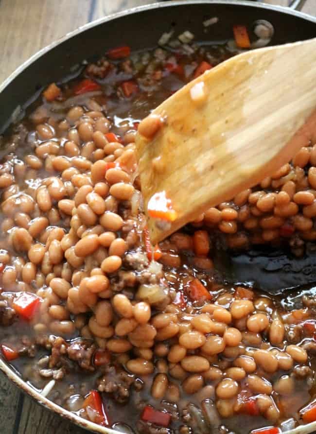 These Best Ever Meaty BBQ Baked Beans will be the hit of your backyard party or cookout this summer. Bring these to your next potluck - they are always a crowd favorite. 