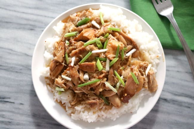 Slow Cooker Bourbon Chicken is an easy and tasty weeknight or busy weekend meal. The rich bourbon ginger sauce is sweet and tangy. This meal is perfect served over rice with a side of steamed broccoli.