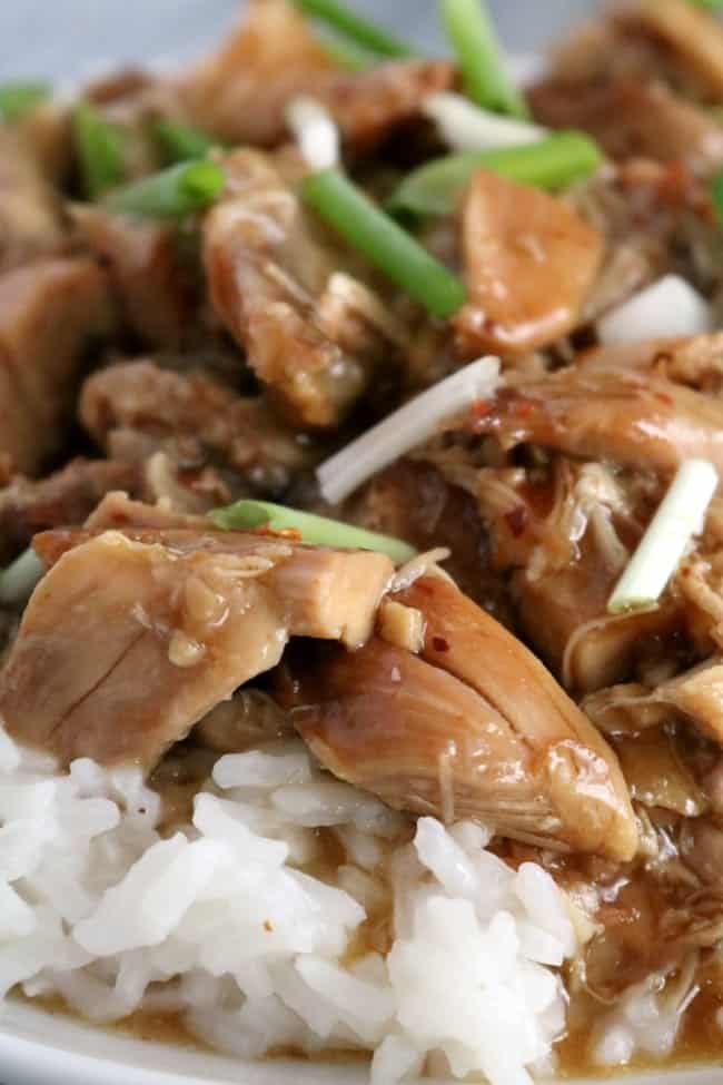 Slow Cooker Bourbon Chicken is an easy and tasty weeknight or busy weekend meal. The rich bourbon ginger sauce is sweet and tangy. This meal is perfect served over rice with a side of steamed broccoli.