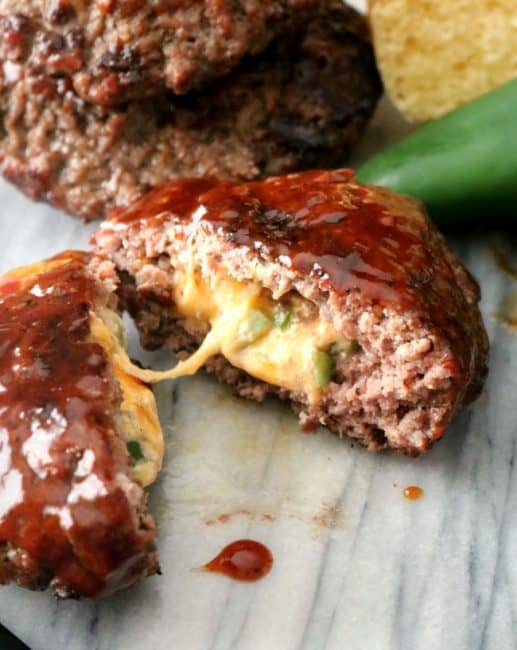 I love the flavor of jalapeños with cheddar cheese, and BBQ sauce. Finally, I've gone and put it all together on the grill with these Stuffed Jalapeño Cheeseburgers!