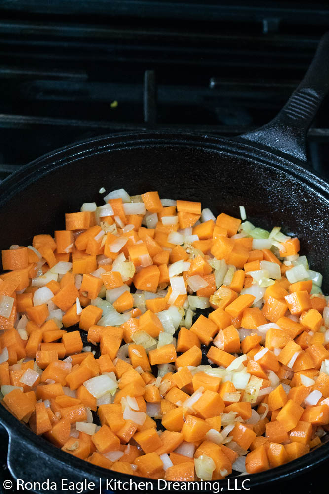Saute the onions, garlic, and carrots.