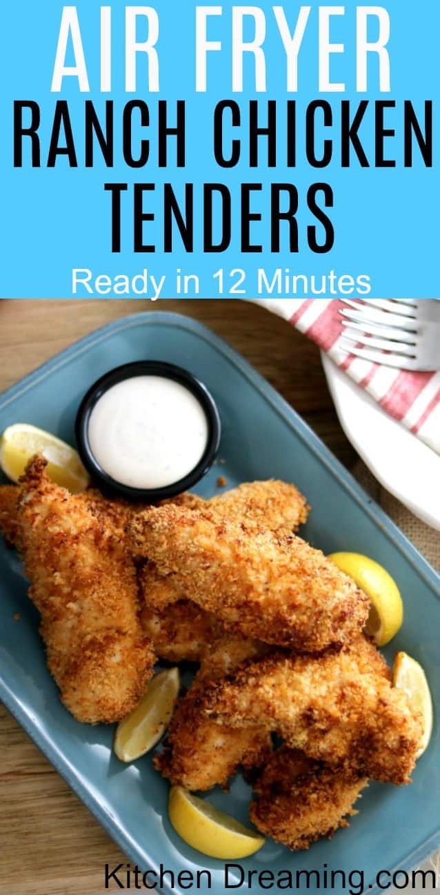 A pinnable pinterest image of a plate of air-fried chicken tenders with lemon wedges.