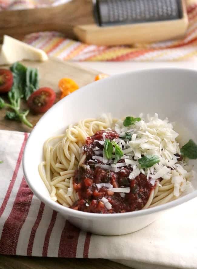 This quick Homemade Spaghetti Sauce is rich, deliciously seasoned, and yet still easy enough to make any night of the week.