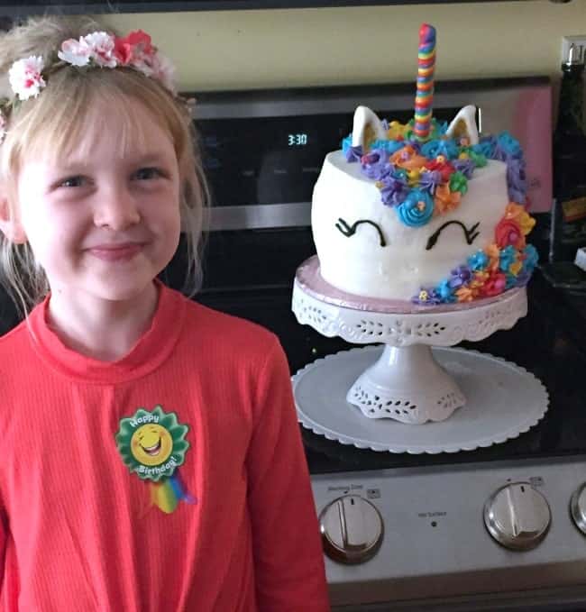 my daughter and her mystical unicorn cake. 