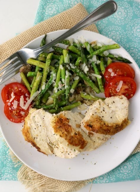 Oven Baked Chicken plated with asparagus