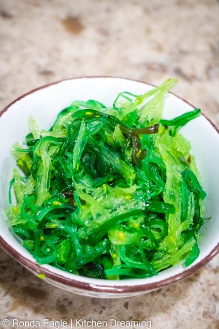 A bowl of seaweed salad. The ingredients list included wheat. Omit seaweed salad if you are allergic to wheat. 