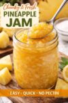 Small batch pineapple jam on a toasted English muffin with a bite taken out, glossy chunky texture, no pectin homemade jam.