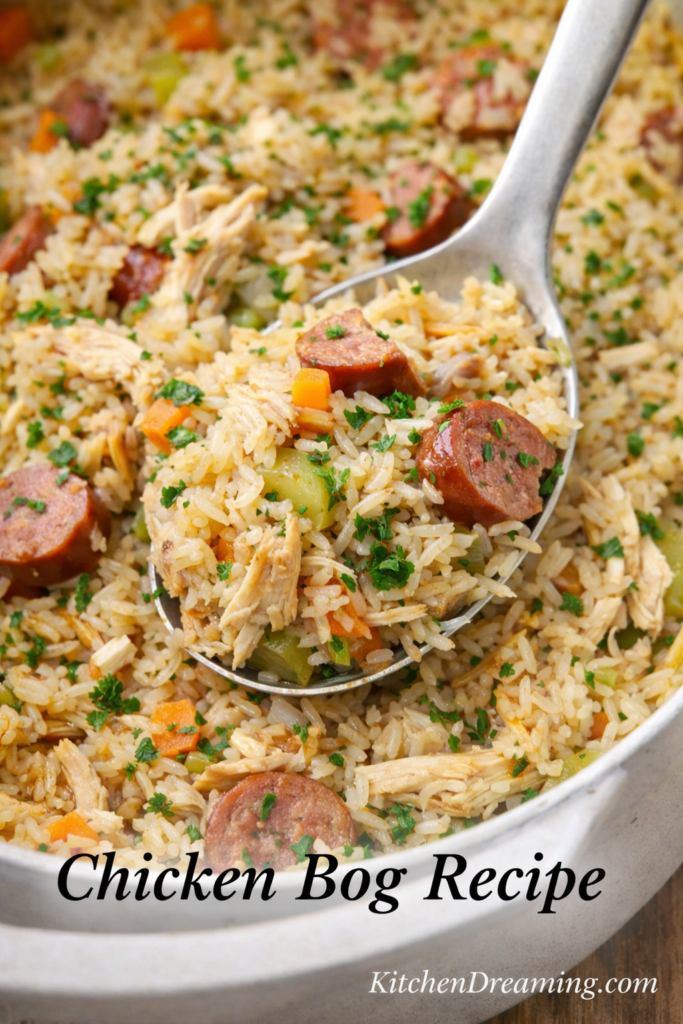 Chicken Bog Recipe (Lowcountry Chicken Pilau) One-Pot Southern Chicken and Rice 5 Close up fork bite of chicken bog recipe showing fluffy rice, smoked sausage slices, shredded chicken, diced vegetables, and parsley.