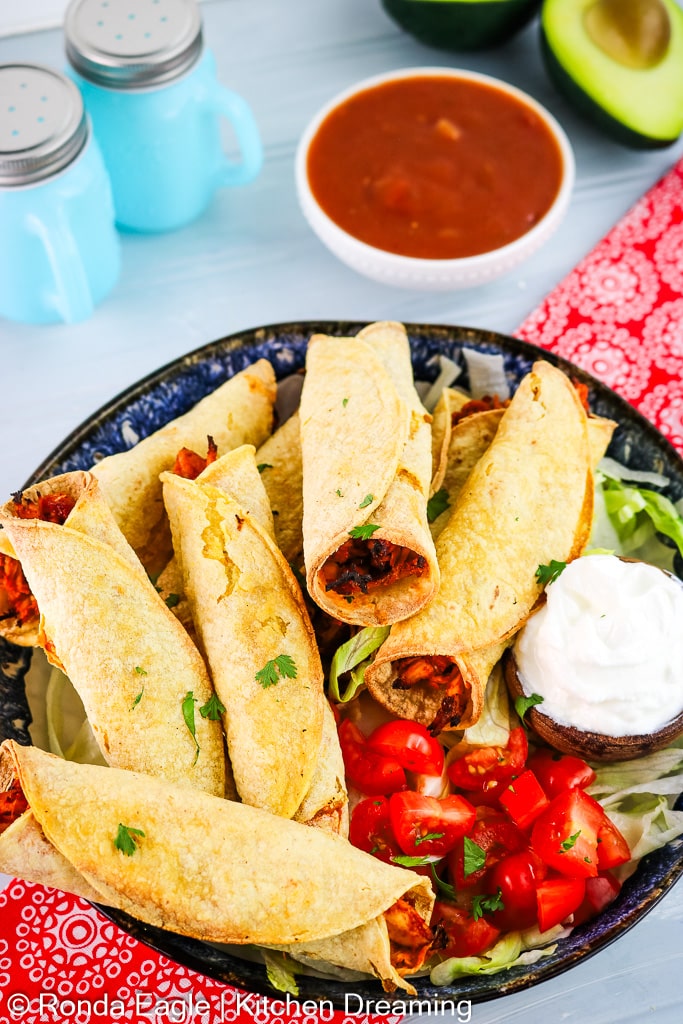 These little bites of joy are a crispy, golden delight filled with your choice of mouthwatering ingredients. With the magic of air frying, you'll enjoy the perfect blend of crunch and tenderness, all without the guilt of deep frying. I promise these Air Fryer Taquitos will leave your family begging for them again and again. Since they are freezer-friendly, you can prepare a double batch to freeze for quick weeknight dinners or game day snacks! Say adiós to the hassle of frying and hola to the tastiest, healthiest taquitos you've ever had!
