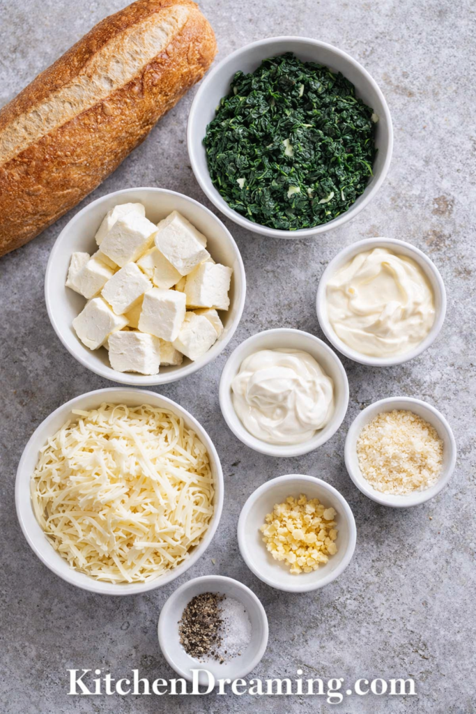 Spinach Dip Bread Boat Recipe for Easy Party Appetizers 2 Spinach Dip Bread Boat, ingredients measured and arranged overhead.