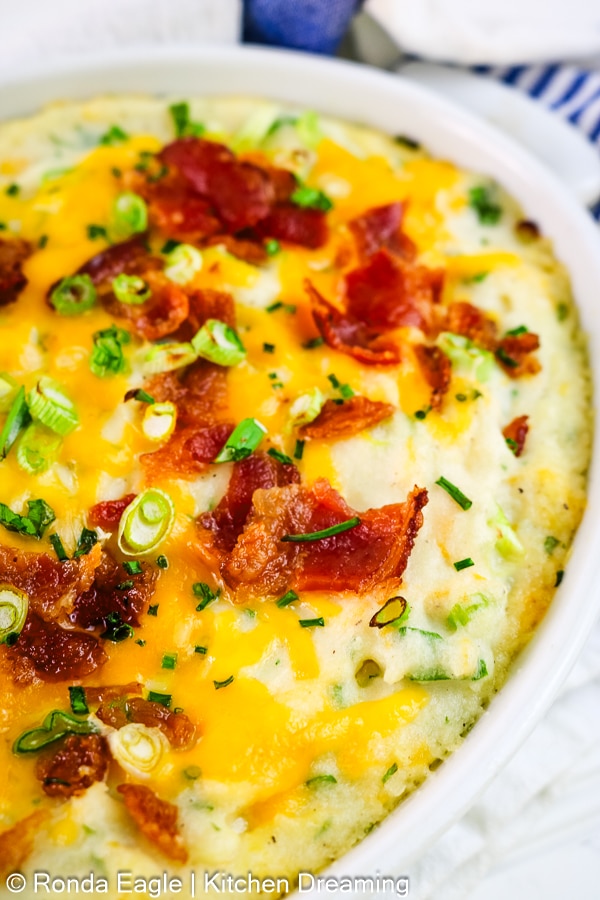Irresistible Instant Mashed Potato Casserole, featuring creamy goodness, crispy bacon, and melty cheese. This comfort food classic is ready in under 30 minutes!
