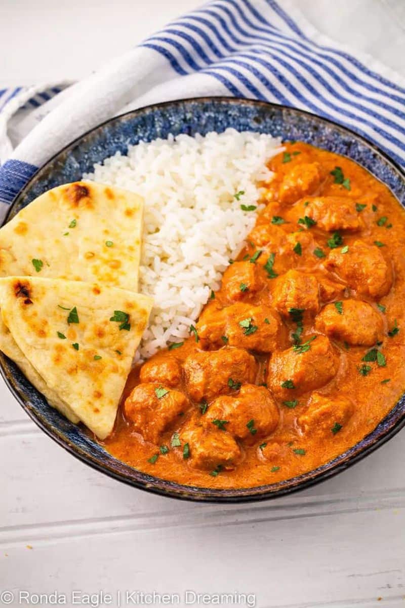 Creamy 30-minute butter chicken served with rice and naan