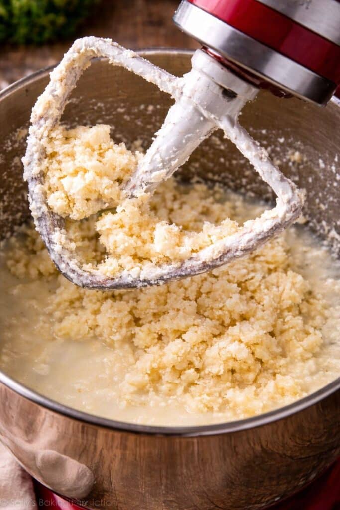 How to Make Homemade Butter (2 Easy Methods) 5 Homemade butter forming in a stand mixer as heavy cream separates into butter and buttermilk.