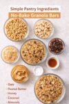 Measured ingredients for no-bake granola bars including granola, cereal, peanut butter, honey, almonds, coconut, dates, vanilla, and salt arranged on a light surface.