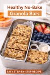 No-bake granola bars packed in a stainless steel lunchbox with fruit and nuts, showing a healthy lunchbox snack idea using homemade granola bars.