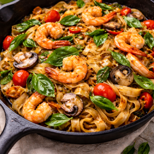 Drunken Noodles Recipe Better Than Takeout 7 Drunken noodles recipe cooked in a cast iron skillet with shrimp, mushrooms, Thai basil, and Thai chiles in a savory soy based Pad Kee Mao sauce.