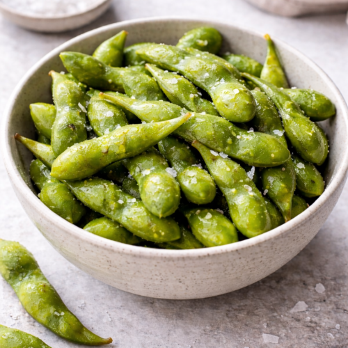 steamed edamame in bowl with sea salt easy healthy snack